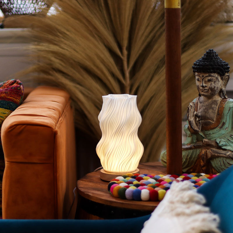 wave lamp switched on set on table in calm setting