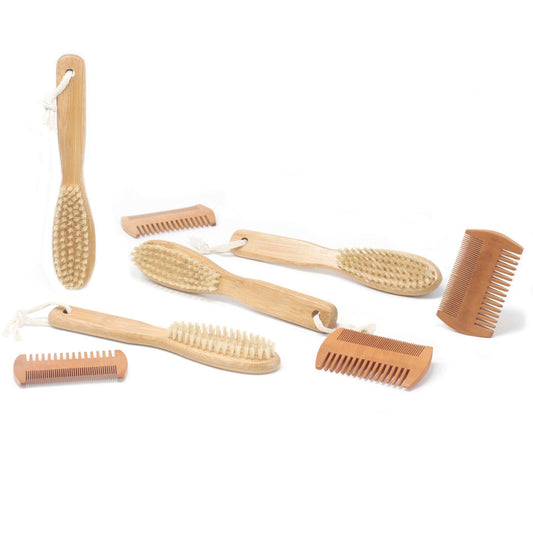 various beard brushes and combed against white background